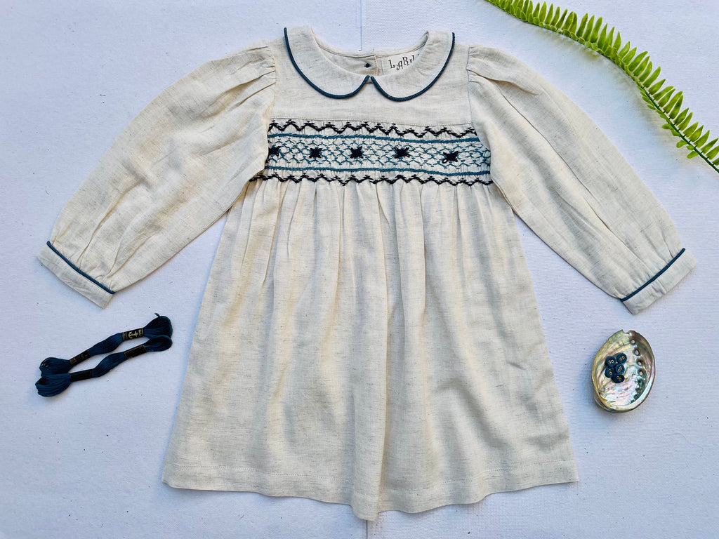 cream smocked dress for toddlers 