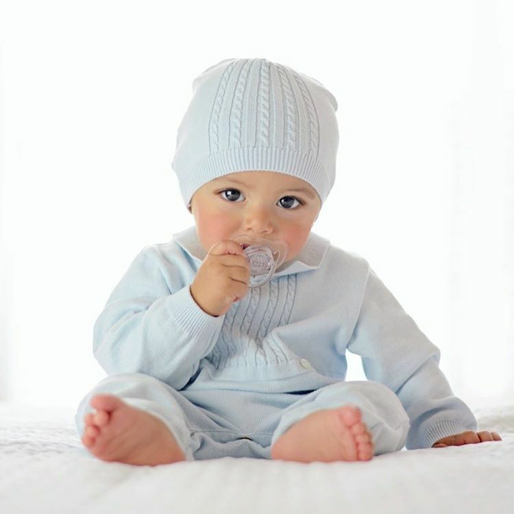 baby in cable knit Longall 